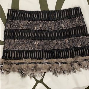 Black lace with feathered skirt